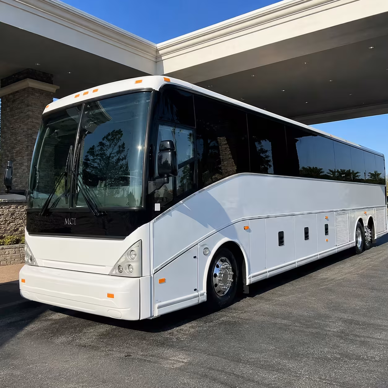 auburn employee bus rentals with every option side by side